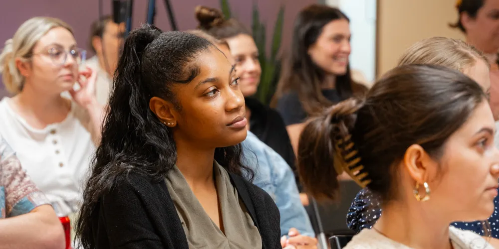 Diverse group in a meeting at Gregory