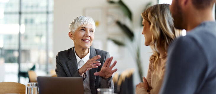 An RIA advisor working with clients on their financial plan