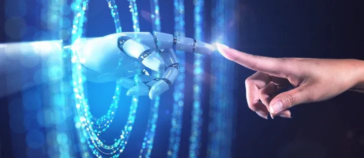 An AI robot hand and human hand touching fingers