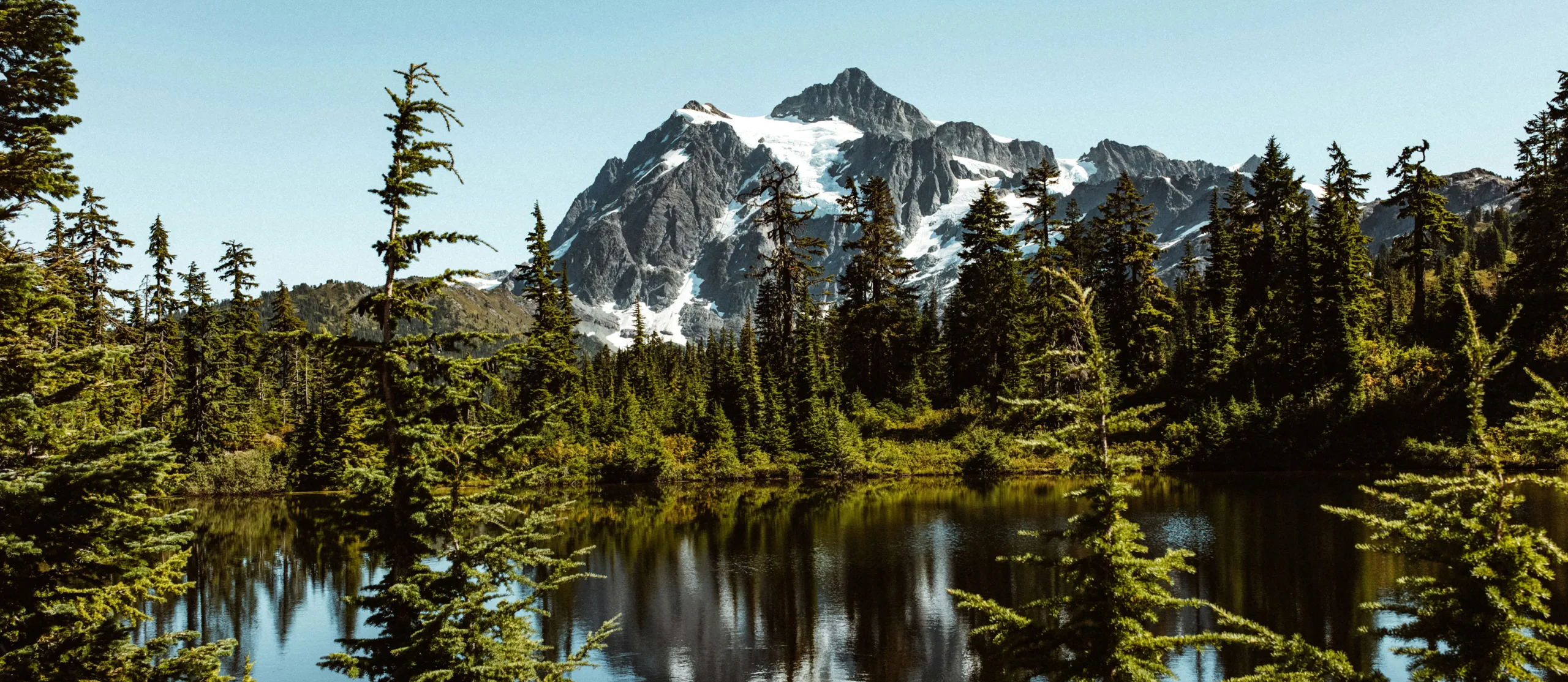 Allianz Image of mountains and lake for Allianz