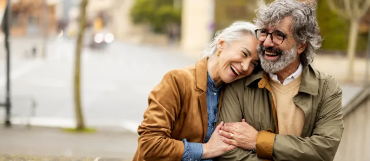 Image of couple that are walking in the park and enjoying their retirement